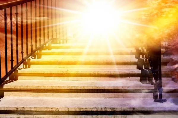 Steps leading up to the sun. Way to God . bright light from heaven . Religious background . Beautiful sky . Sunrise . Light from sky