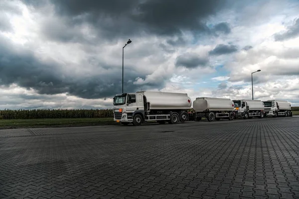 fuel truck at gas station, delivery of dangerous goods