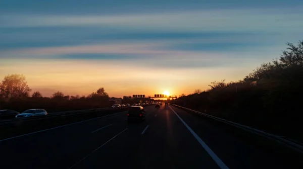 Sunset Road Cars And Trucks At Sunrise Night Highway Car Traffic At Night Travel Yellow Stock Photo 272594084