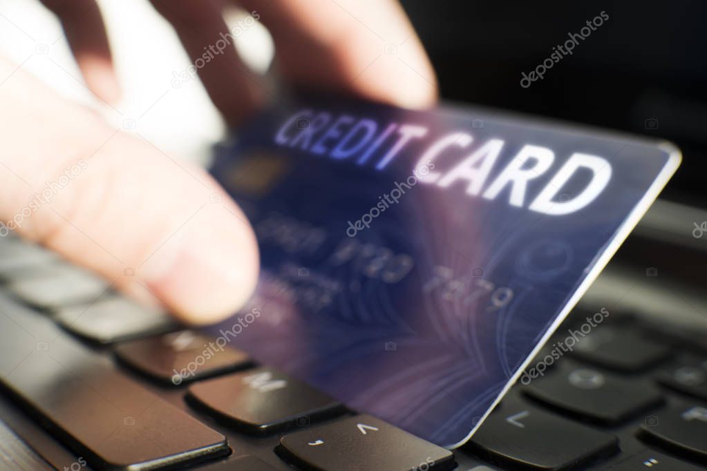Keyboard with button pay and credit card - payment concept I am author of image used on credit card and used data are fictitious.