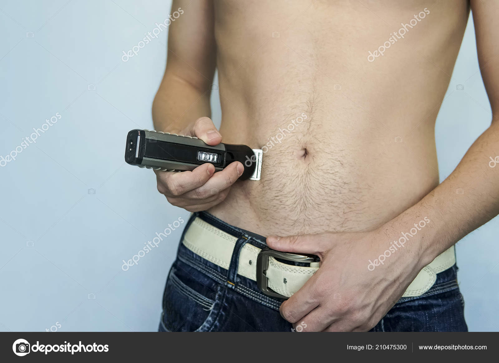 Closeup Young Man Trimming Hair His Pubis Electric Trimmer Concept