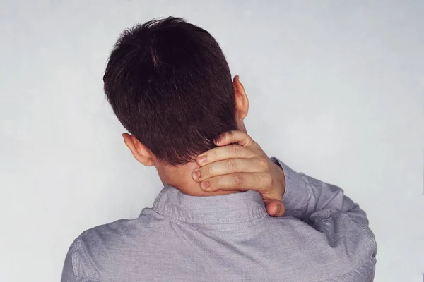 Businessman neck pain after working in the office too long time. instability of cervical vertebrae. neck pain. cervical chondrosis — Stock Image Businessman Neck Pain Working Office Too Long Time Instability Cervical Royalty Free Stock Photos