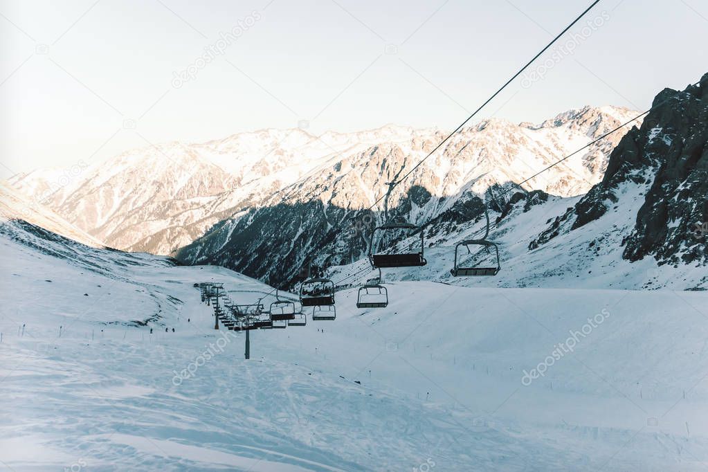 ski resort Shymbulak, Kazakhstan, Almaty, gondolas. cable car in the mountains. retro photo tinting