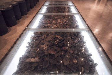 The Hall of Names in the Yad Vashem Holocaust Memorial Site in Jerusalem, Israel, some Shoe remains of the some 6 million Jews murdered during World War ll clipart