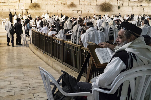 Religious orthodox jew praying at the Western wall in Jerusalem old city. JERUSALEM, ISRAEL. 24 October 2018