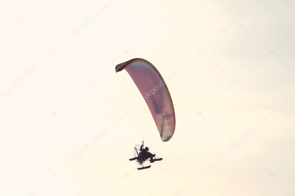 paraglider in flight. winter paraglider in the sky.