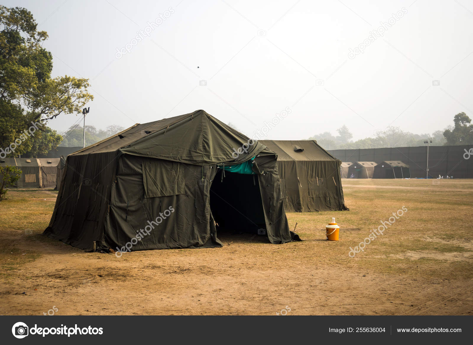Military tent in the field. big tent city. field camp in nature