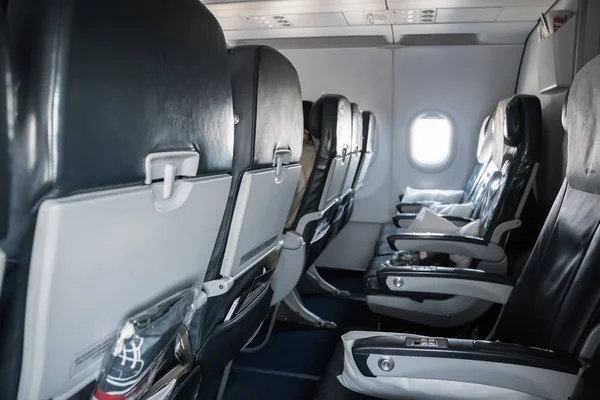 Empty airplane seats. Inside the cabin of a Boeing. Seats in economy class