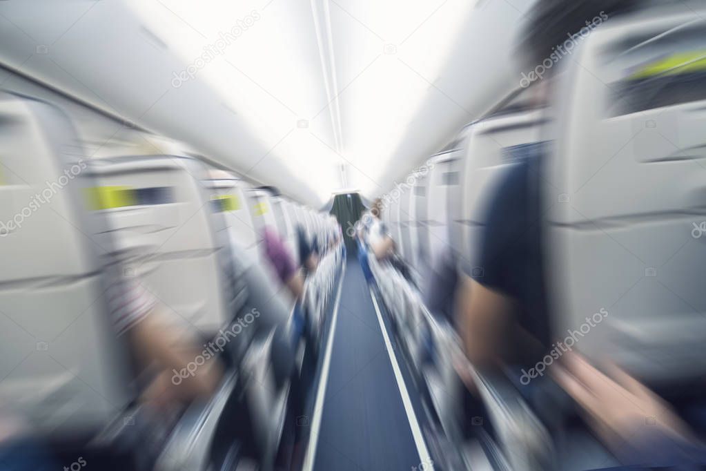 aerophobias concept. plane shakes during turbulence flying air hole. Blur image commercial plane moving fast downwards. Fear of flying. collapse slump, depression, downfall, debacle, subsidence. dive.