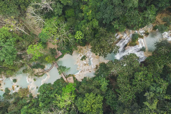 Kuang Si Waterfalls Luang Probang Laos. long exposure. Beautiful scenery. Waterfall in the wild jungle. Asian nature. top view, aerial view