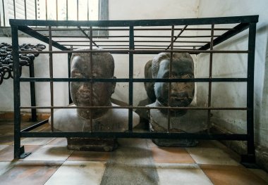 Prison Cell of S21 the notorious torture prison by the khmer rouge at Phnom Penh on Cambodia clipart