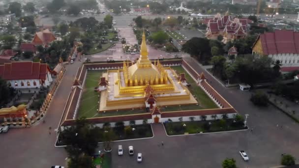 Pha That Luang, Great Stupa is a gold-covered large Buddhist stupa in the centre of Vientiane, Laos. It is generally regarded as the most important national monument in Laos — Stock Video