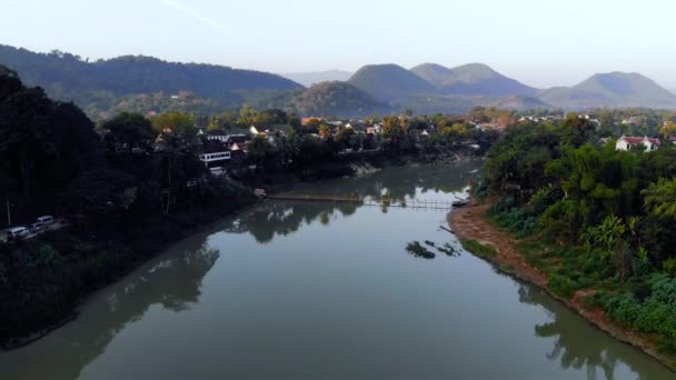 Beautiful sunset over in Luang prabang, Laos. Nam Kahn River, a tributary of the Mekong River — Stock Video