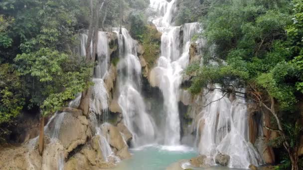 Long Exposure photography of Tad Kuang Si waterfall, Lungprabang, Lao. Beautiful photo of exotic Asian landscape. photo from the drone, — Stock Video