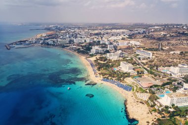 Top view of city of Cyprus and the city of Ayia NAPA. Air view of the resort Mediterranean coastal city. clipart