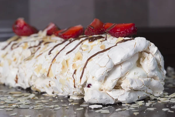 strawberry cake . Pavlova - meringue cake with fresh strawberries. meringue roulade with creamstrawberries and raspberries