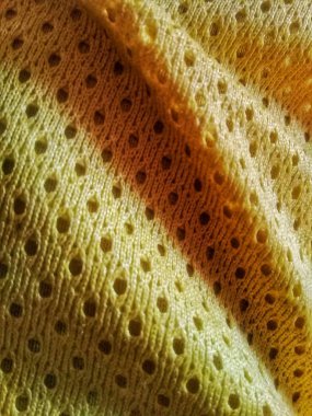 sarı kumaş dokusu. küçük noktalı deseni