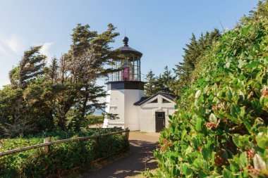 Cape Meares Lighthouse at daytime over the Pacific Ocean, Oregon state, USA clipart
