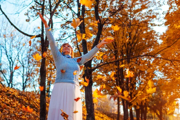 Middle Aged Woman Throwing Leaves Autumn Forest Sunset Senior Woman — Stock Photo, Image