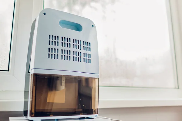 Değmek kapı aynası, nem göstergesi, uv lambası, hava Ionizer, su kabı ile ıslak pencere eserleri dehumidifier. Yakın çekim