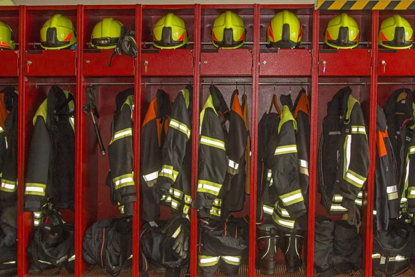 A look into the neatly organized and well-organized clothing and equipment locker of a fire station