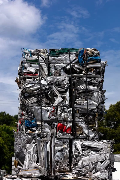 aluminum profiles and scrap pressed into cubes for remelting in a foundry