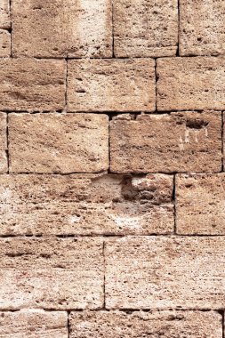 bir duvar, geniş format resim ve arka plan olarak çözünürlük oluşturan büyük dikdörtgen taş büyük doku ile açık kahverengi renk