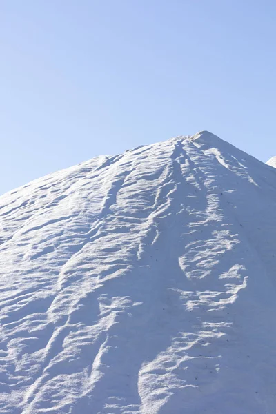 white salt mountain on blue background, high resolution image and size
