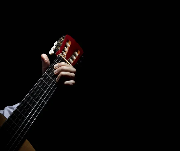 Spanische Gitarre im Dunkeln — Stockfoto