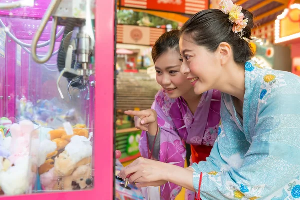 Asian Young Ladies Playing Doll Catching Machine Together One Pointing — Stock Photo, Image