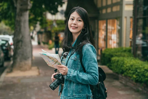 Woman Smiling Joyfully Camera Holding Guide Map Hands While Walking — Stock Photo, Image