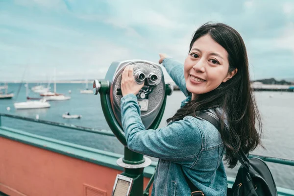 Happy Attractive Girl Using Telescope Looking Camera One Hand Pointing — Stock Photo, Image