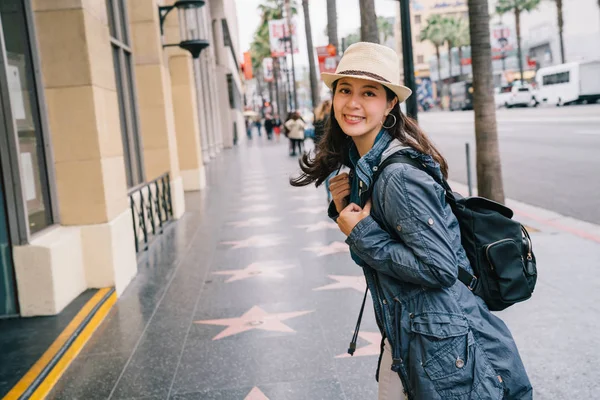 Female Traveler Wearing Straw Hat Joyfully Walking Street Young Backpacker — Stock Photo, Image