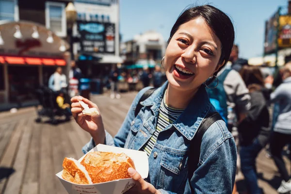Asian Female Traveler Cheerfully Trying Tasty Clam Chowder Soup Sourdough — Stock Photo, Image