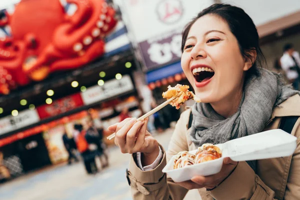 Cheerful Lady Tourist Trying Tasty Famous Takoyaki Girl Backpacker Laughing — Stock Photo, Image