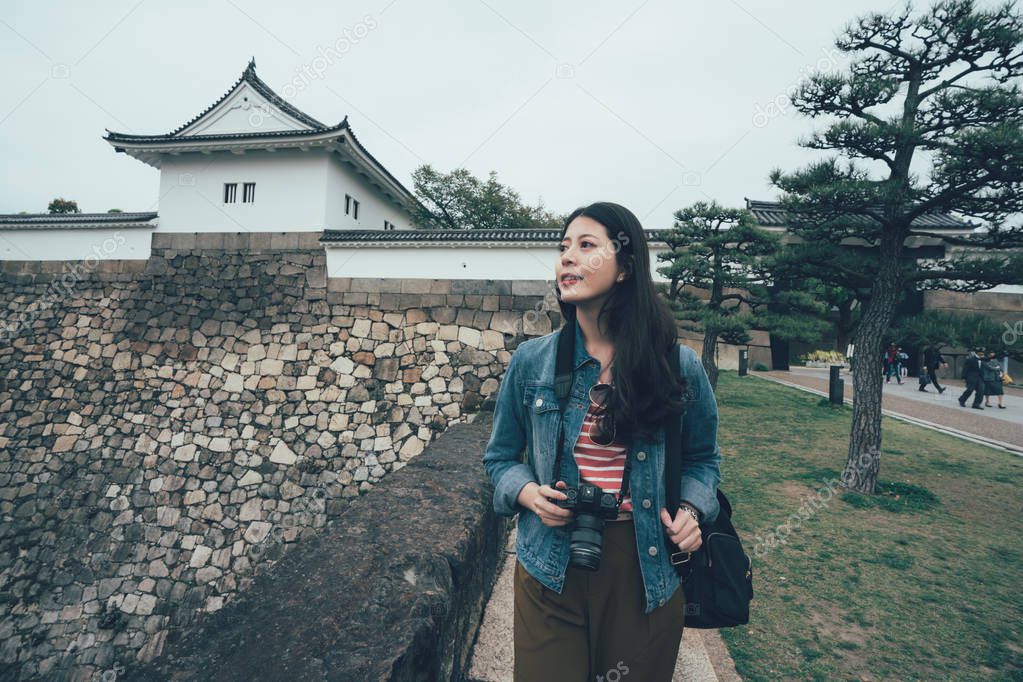 photographer walking in famous tourism attraction