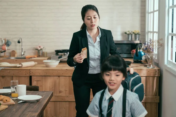 mom businesswoman take away toast hold backpack