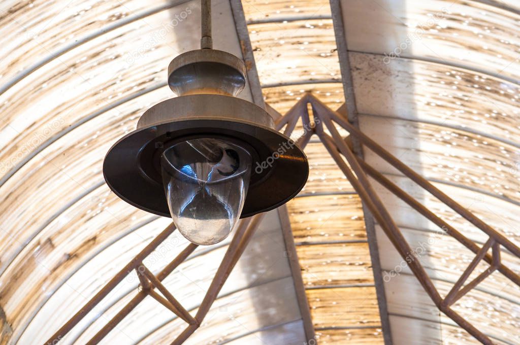 Retro lamp on a grunge background, flea market ceiling