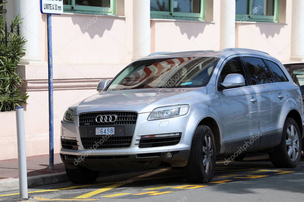 Menton, France - April 5, 2018: Luxury Audi Q7 SUV (Front View) Parked In The Street of Menton, French Riviera, Europe