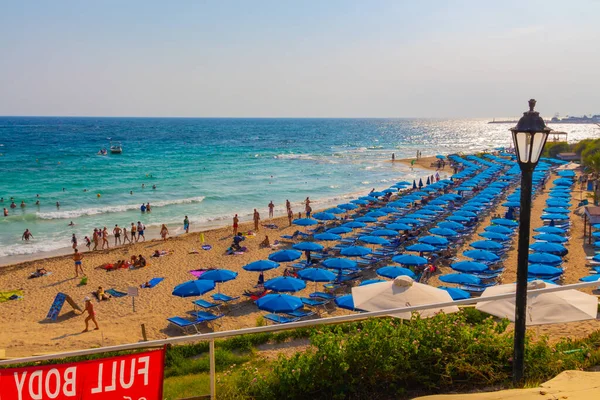 Ayia Napa Cyprus September 2019 Crowded Beach Tourists Blue Umbrellas — Stock Photo, Image