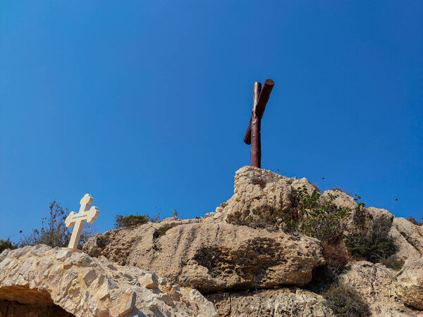 Wooden ans stone crosses over Agios Epiphanios church in Ayia Napa, Cyprus