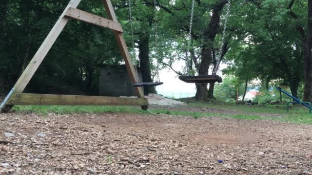 Swinging Empty Swings Park Summer Day — Stock Video