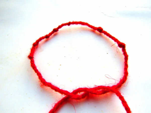 Red Thread Knots White Background Macro — Stock Photo, Image