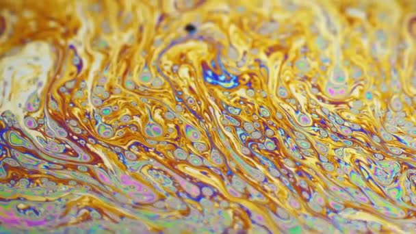 Psychedelic background of motion surface of colorful soap bubble — Stock Video