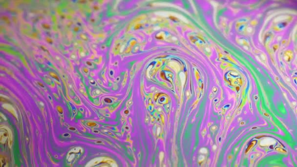 Psychedelic background of motion surface of colorful soap bubble — Stock Video