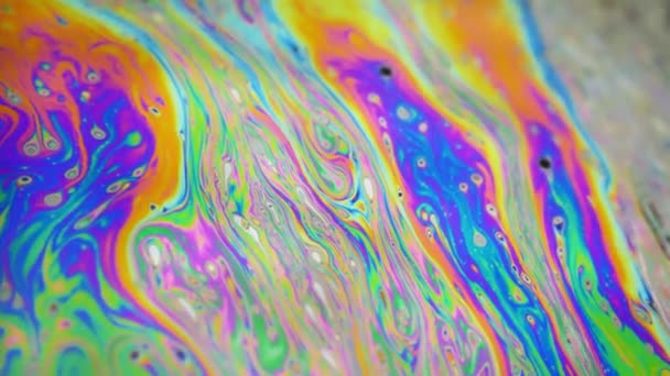 Fond psychédélique de surface de mouvement de bulle de savon coloré — Video