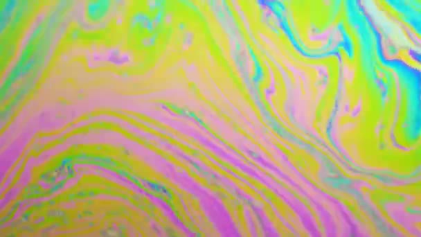 Psychedelic background of motion surface of colorful soap bubble — Stock Video