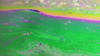 Renkli arka plan şaşırtıcı hareket çok renkli sabun köpüğü yüzeyinde oluşan