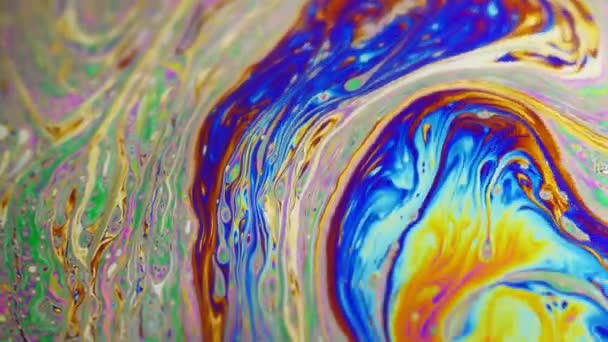 Amazing colorful background formed of motion multicolored surface of soap bubble — Stock Video