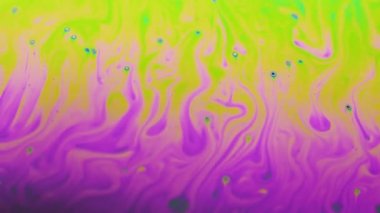 Renkli arka plan şaşırtıcı hareket çok renkli sabun köpüğü yüzeyinde oluşan